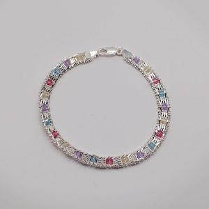 Elegante brazalete con estilo trenzado de plata .925 con piedras de colores