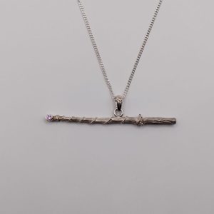 Dije de varita mágica