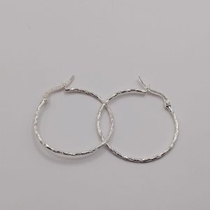 Arracadas torcidas grandes